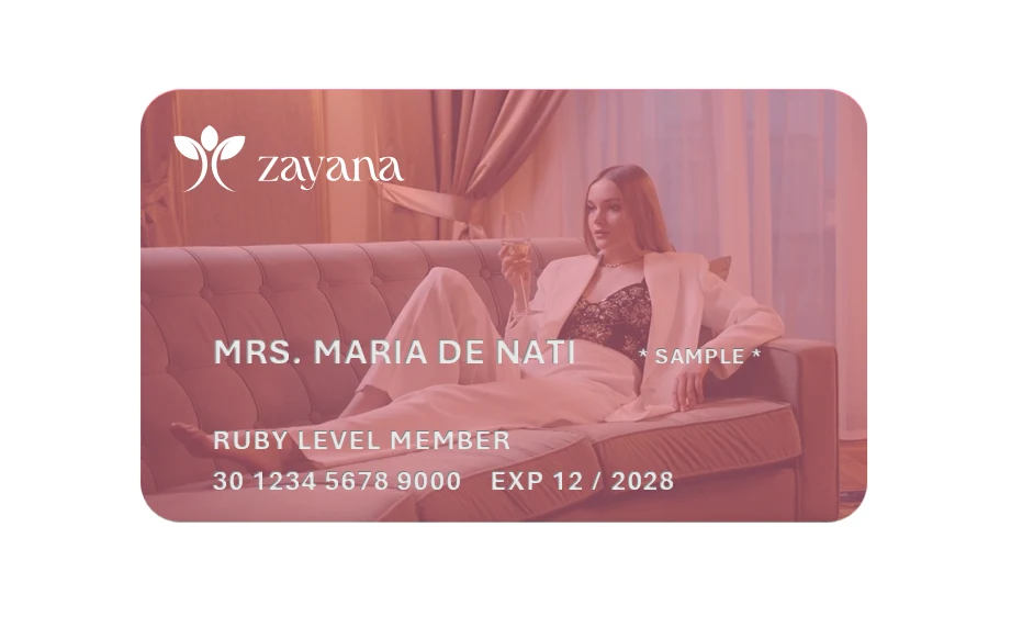 Členská karta Zayana Circle Ruby v temně červené se zlatým lotosem.